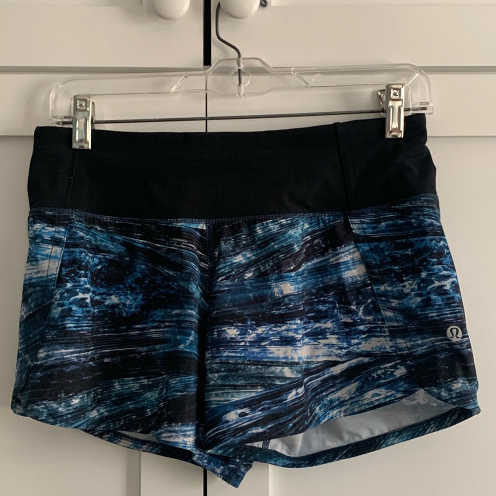Lululemon running shorts, Size 4, 4” inseam, waist 14.5” across.